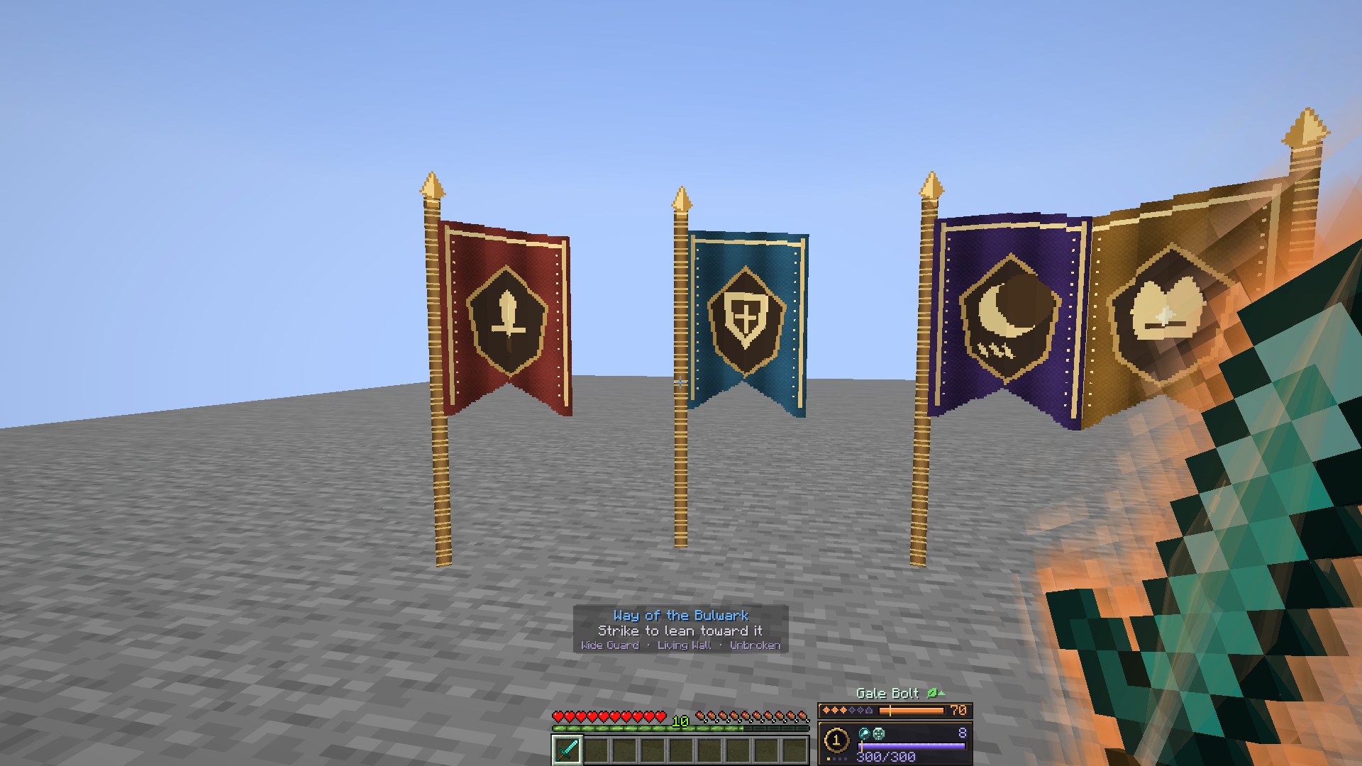 Through the player's own eyes: the four crested cloth standards in a row ahead, the blue shield standard under the crosshair, and above the hotbar the words Way of the Bulwark, Strike to lean toward it, and the names of its three nodes