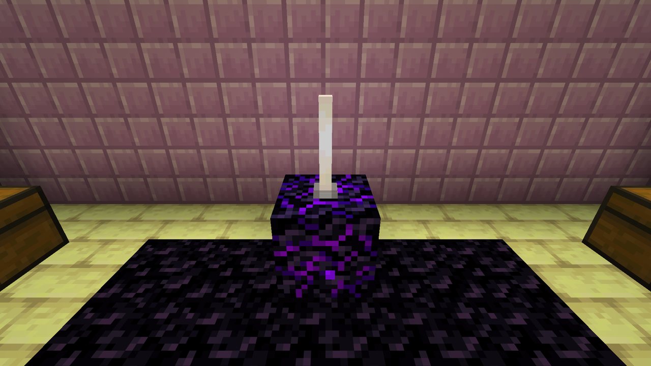 The Observatory vault: a crying obsidian block with an end rod on it, between two chests on an end stone floor